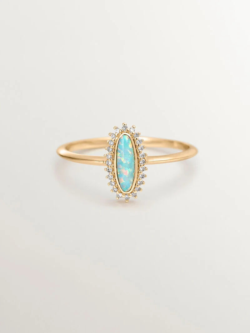 RI-ALQVIMIA TURQUOISE OPAL RING خاتم ذهب عيار 18 بحجر الأوبال مرصع بالألماس عيار 0,15