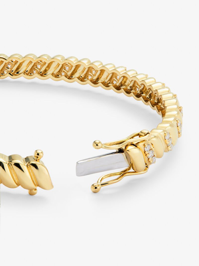 Rigid yellow gold bracelet of 18k with white diamonds in 0.58 cts اسورة من الذهب عيار 18 مرصعة بالالماس 0.58 قيراط